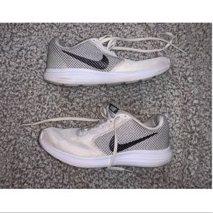Nike grey and white running shoes